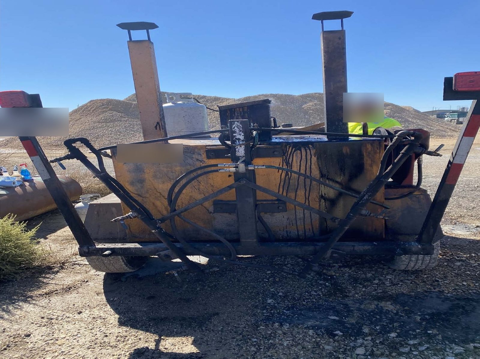 An older crack seal small tank