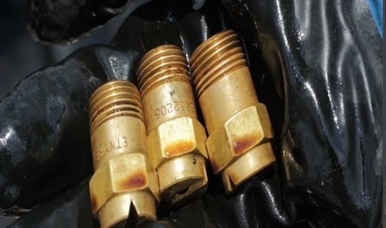 Distributor spray nozzles after cleaning